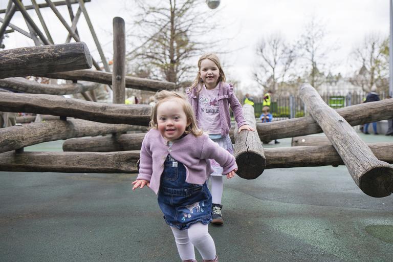 Girls play in play area