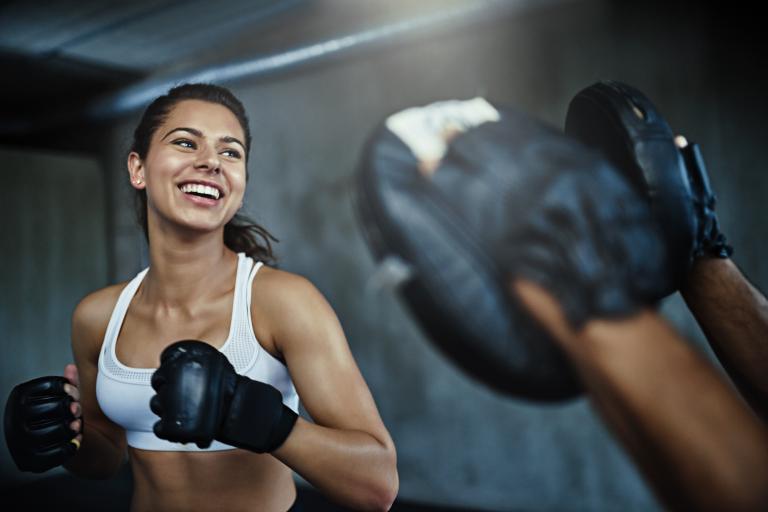 young woman boxing training