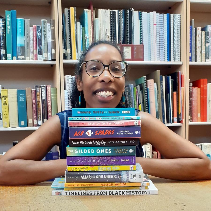 Zoey Dixon of Lambeth Library with books 
